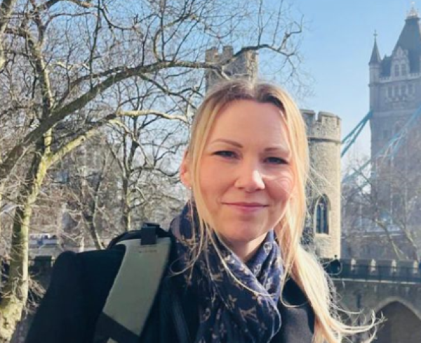 Charlotte Wright with Tower Bridge in the background